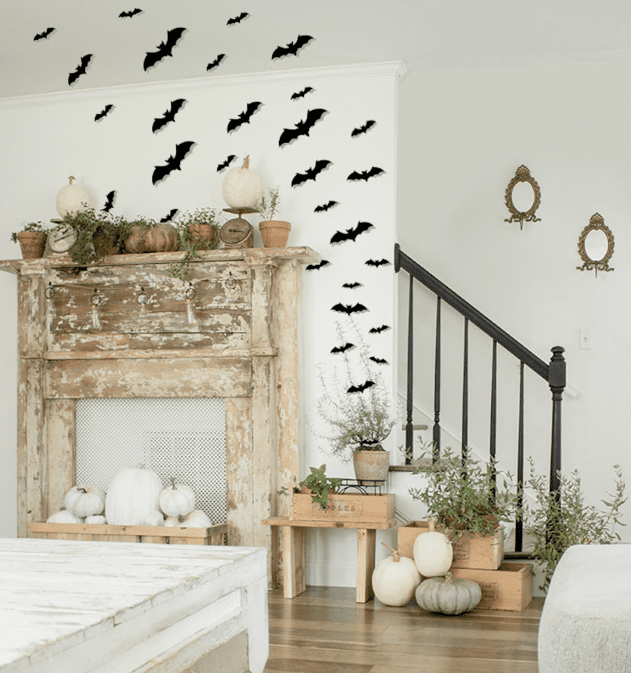 paper bats over a fireplace